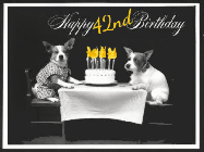 Happy Birthday Age 42 GIF, 42nd Birthday GIF: Vintage animated birthday card gif with name, flickering candles, birthday cake, and 2 dogs sitting at the table.