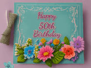 Happy Birthday Age 50 GIF, 50th Birthday GIF: Animated Birthday GIF as a colorful birthday card reading Happy Birthday Name and flower petals floating past.