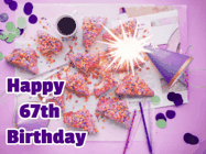 Happy Birthday Age 67 GIF, 67th Birthday GIF: A big paper sparkle highlights this animated birthday gif showing a birthday cake place setting with decorations.