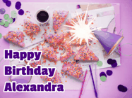 Happy Birthday Alexandra GIF: A big paper sparkle highlights this animated birthday gif showing a birthday cake place setting with decorations.