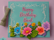 Happy Birthday Barb GIF: Animated Birthday GIF as a colorful birthday card reading Happy Birthday Name and flower petals floating past.