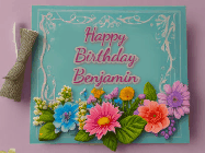 Happy Birthday Benjamin GIF: Animated Birthday GIF as a colorful birthday card reading Happy Birthday Name and flower petals floating past.