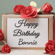 Happy Birthday Bonnie GIF: An elegant gift box label animated gif with glitter flowing over the label and a name appearing that you can customize. The scene is decorated with roses