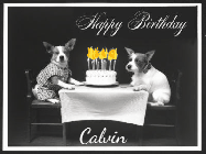 Happy Birthday Calvin GIF: Vintage animated birthday card gif with name, flickering candles, birthday cake, and 2 dogs sitting at the table.