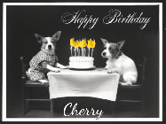 Happy Birthday Cherry GIF: Vintage animated birthday card gif with name, flickering candles, birthday cake, and 2 dogs sitting at the table.