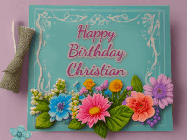 Happy Birthday Christian GIF: Animated Birthday GIF as a colorful birthday card reading Happy Birthday Name and flower petals floating past.