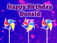 Happy Birthday Donald GIF: Animated birthday gif with name of 3 rotating pin wheels on a purple background with 3 lines of text to customize.