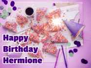 Happy Birthday Hermione GIF: A big paper sparkle highlights this animated birthday gif showing a birthday cake place setting with decorations.