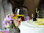 Happy Birthday Hermione GIF: A beautiful and elegant happy birthday animated gif with a cake, flicking candle, animated hearts, and name to customize.