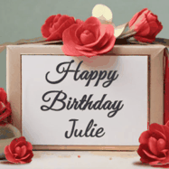 Happy Birthday Julie GIF: An elegant gift box label animated gif with glitter flowing over the label and a name appearing that you can customize. The scene is decorated with roses