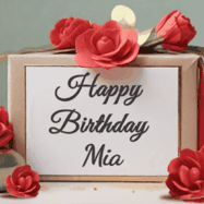 Happy Birthday Mia GIF: An elegant gift box label animated gif with glitter flowing over the label and a name appearing that you can customize. The scene is decorated with roses