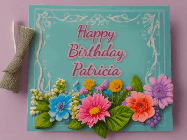 Happy Birthday Patricia GIF: Animated Birthday GIF as a colorful birthday card reading Happy Birthday Name and flower petals floating past.