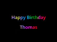 Happy Birthday Thomas GIF: Happy birthday gif with animated rainbow lettering on a black background with hearts float up past them.