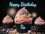 Happy Birthday Tia GIF: A delicious cupcake gif with animated sparkles reading Happy Birthday with a name to customize