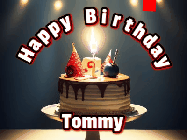Happy Birthday Tommy GIF: Animated happy birthday gif with a cake and flickering candles with colorful falling confetti and text reading Happy Birthday