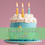 Happy Birthday Vicky GIF: Sparkles fly over a birthday cake that has 3 flickering candles, text in a colored band read Happy Birthday Name.
