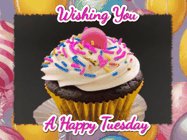 Happy Tuesday GIF, number 20: A cupcake gif with text and happy face emojis floating up from the cupcake
