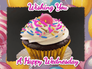 Happy Wednesday GIF, number 20: A cupcake gif with text and happy face emojis floating up from the cupcake