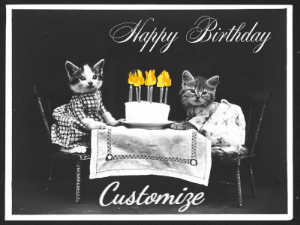 2 cats sit at a table with a birthday cake with animated candles in this birthday gif you can customize with name.