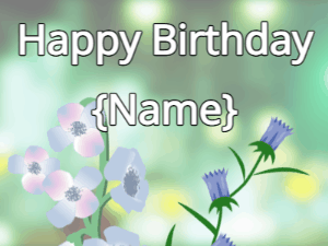 Happy Birthday GIF:Happy Birthday Flower GIF blue & tulips on a green