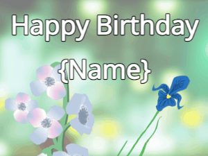 Happy Birthday GIF:Happy Birthday Flower GIF blue & iris on a green