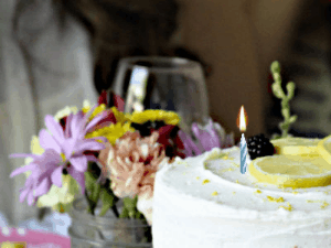 Elegant lemon cake happy belated birthday gif with animated fireworks, and 3 lines of text to customize.